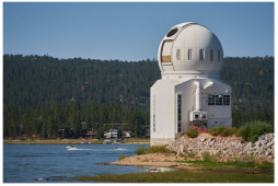 Using the world's largest solar telescope, the 1.6 m Goode Solar Telescope at the Big Bear Solar Observatory, an international science team detected numerous dark features in a big sunspot, which appears as the coldest structure of the sun. These dark features are plasma fibrils aligned with a strong magnetic field at kilo-Gauss at the sunspot. The fibrils oscillate transversely, which means this is a kink MHD wave and they are able to drag the kilo-Gauss magnetic field lines to move laterally. It implies that the fibril kink oscillations could potentially provide a very strong energy flux. The science team has developed a mathematical model of fast kink waves in sunspots and estimated that the energy flux is 1000 to 10000 times stronger than energy losses in active region plasma. This is sufficient to maintain the atmosphere of the Sun at million degrees Kelvin temperature.